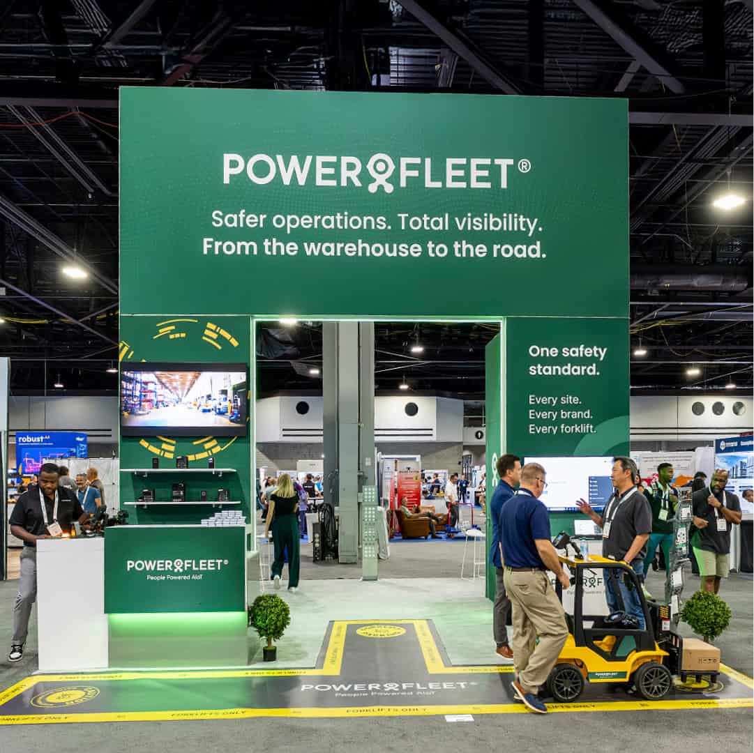 Powerfleet booth at industry event showcasing safety and visibility solutions.