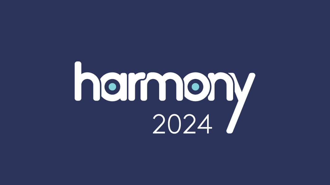 Harmony 2024 logo on a dark blue background for branding.